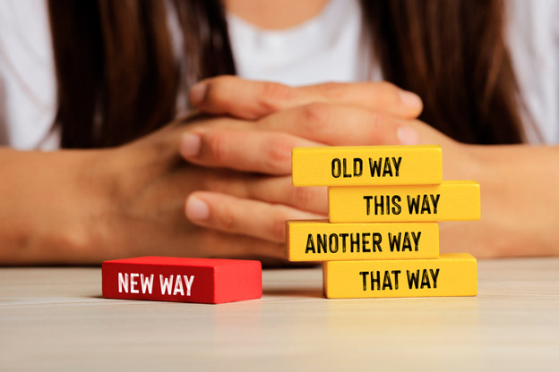Red block that says new way. Yellow blocks that say- old way, this way, that way, another way.