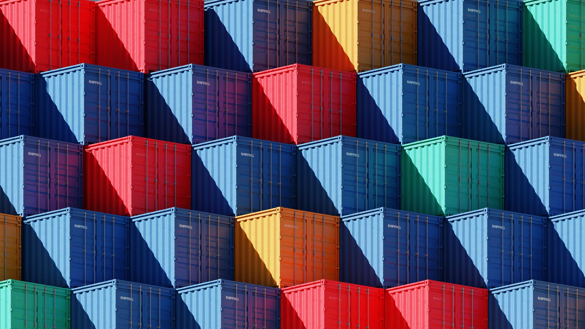 Image of multicolored shipping containers stacked on top of eachother